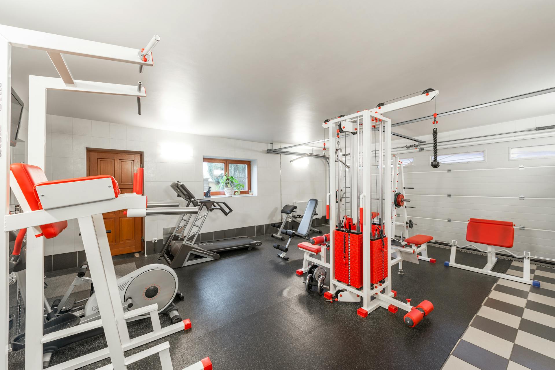 A garage conversion with a home gym inside