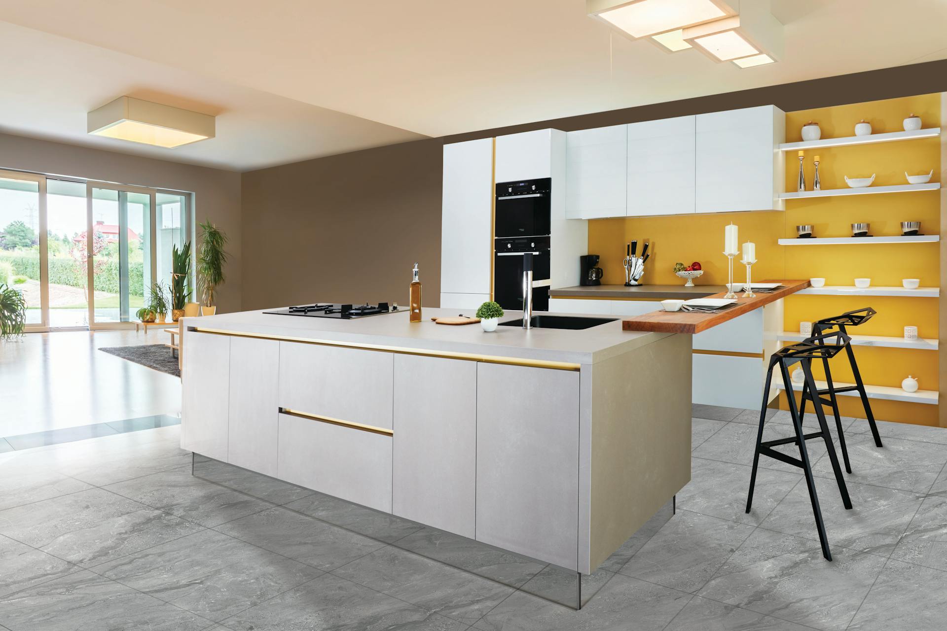 A modern kitchen with white cabinets, an island and a yellow feature wall.