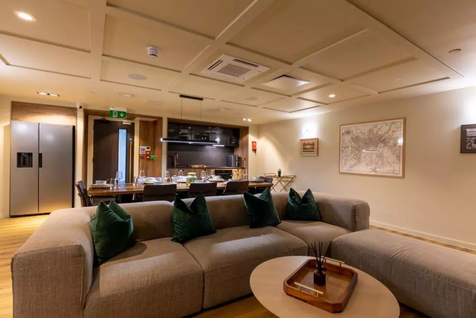 Private dining room within a Build to Rent property with a comfy sofa and dining table