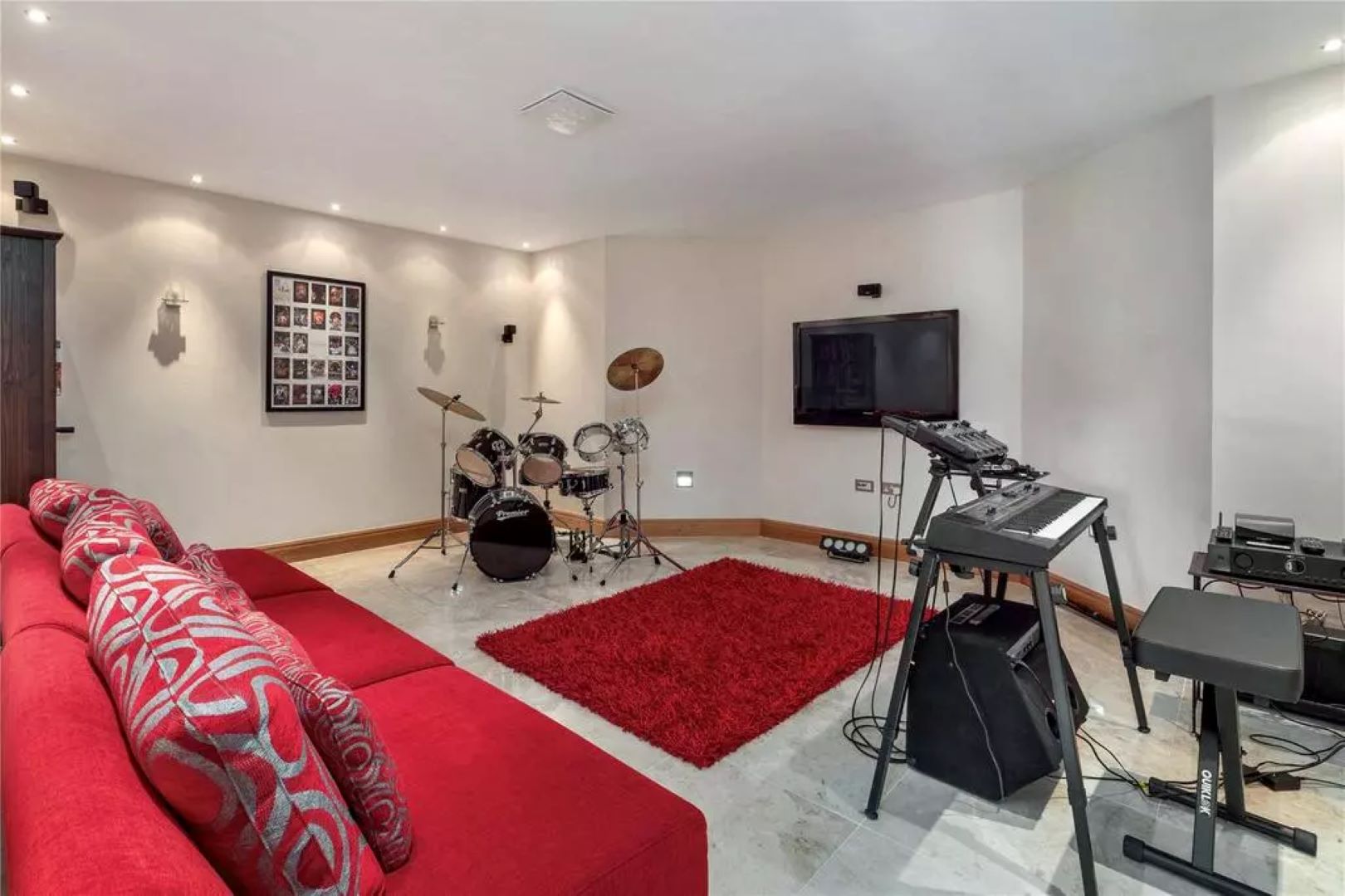 Music studio with drum kit and keyboard